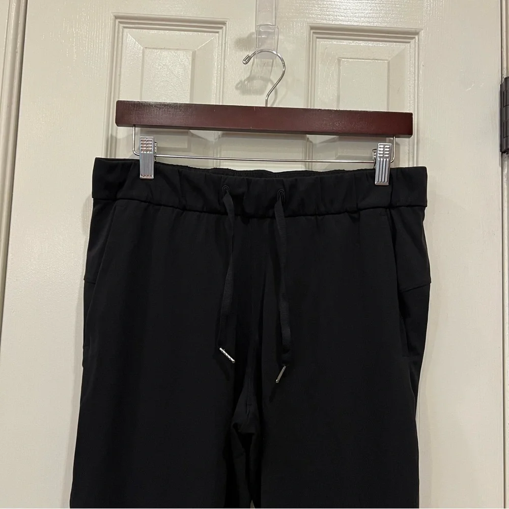 Lululemon On The Fly Pant Luxtreme Black Cropped Pants Drawstring Size 8, 26”
